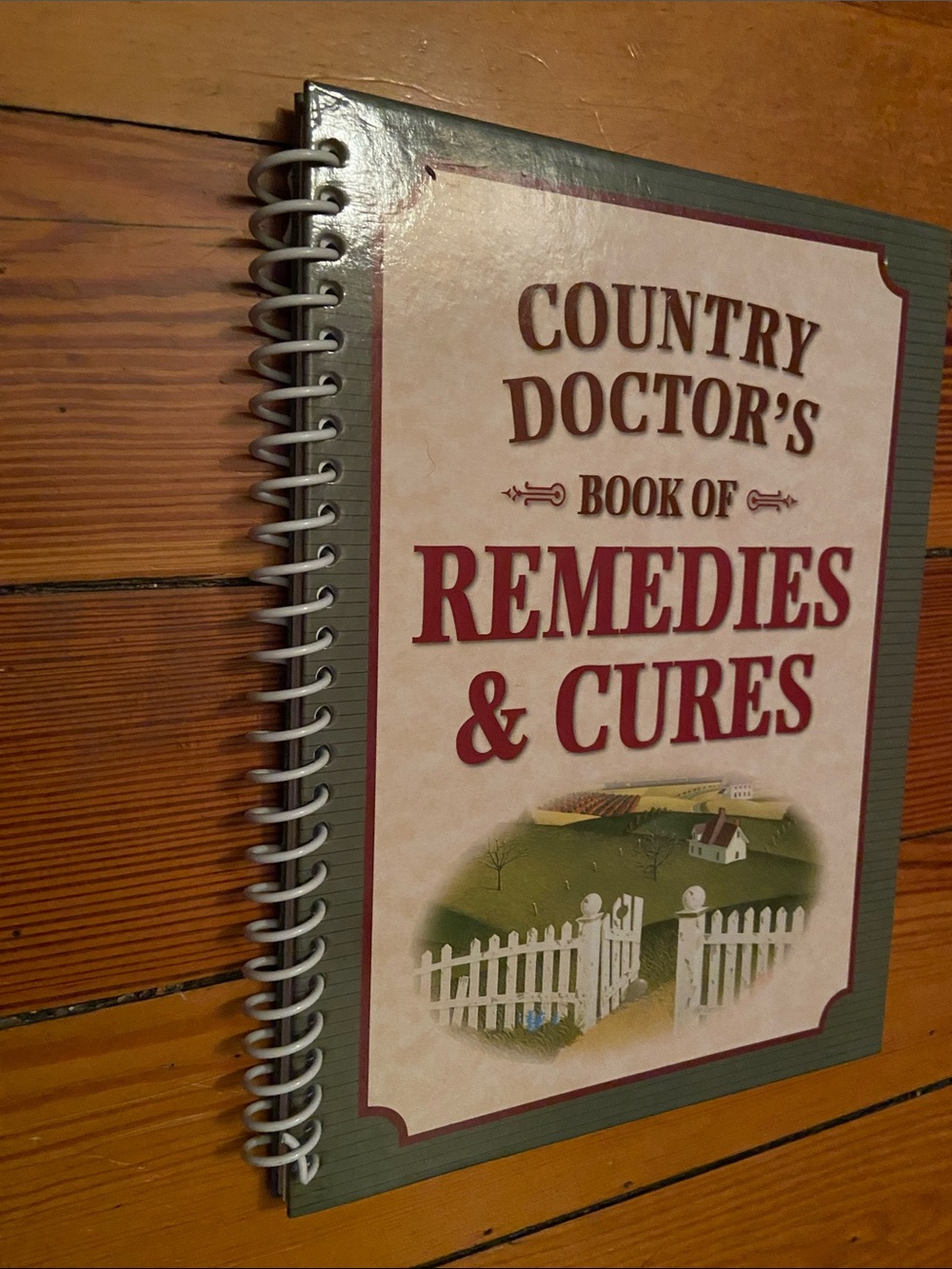 Remedy cure heal Remedies & Cures book White picket fence House green Grass hill